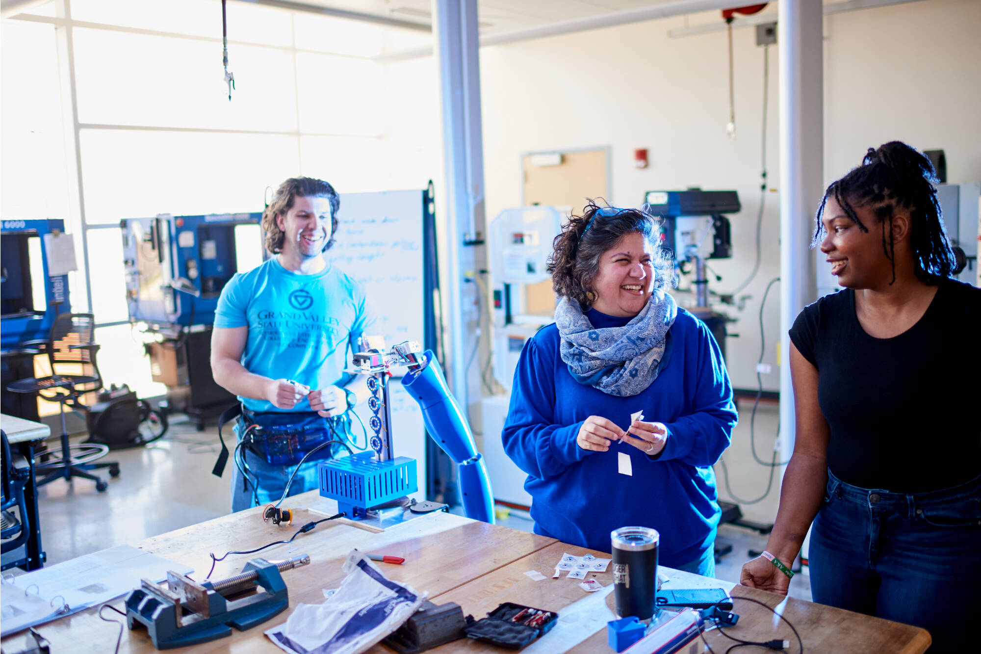Professor Rhodes with two graduate students